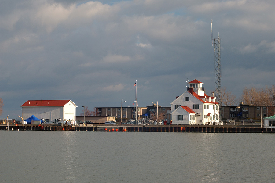 Afb Irondequoit A white building next to a body of water, irondequoit, ny