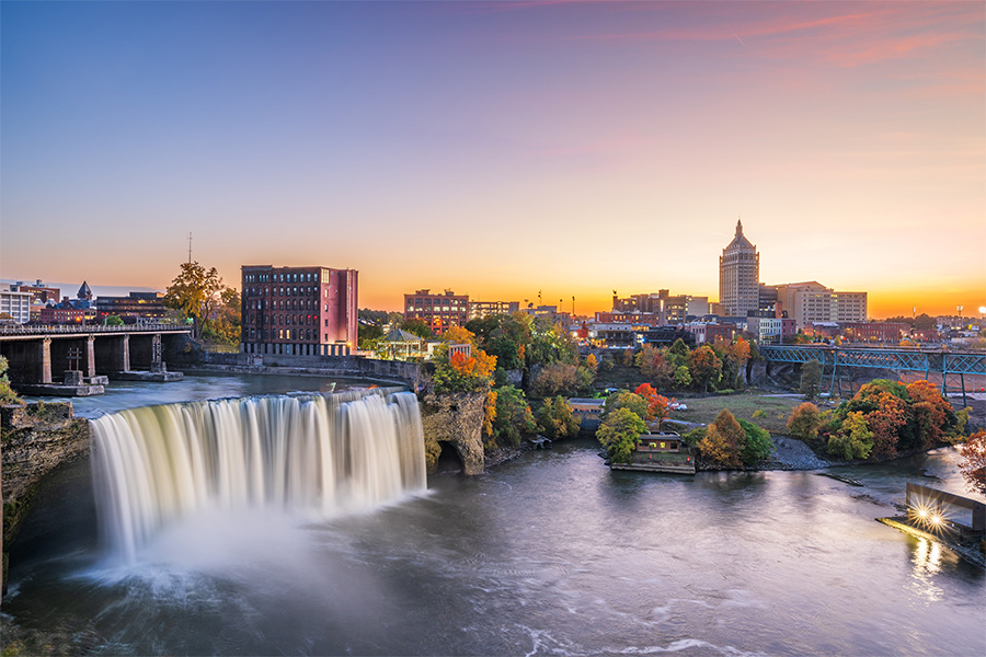 Afb Upperfalls A waterfall and a city. High falls, rochester, ny