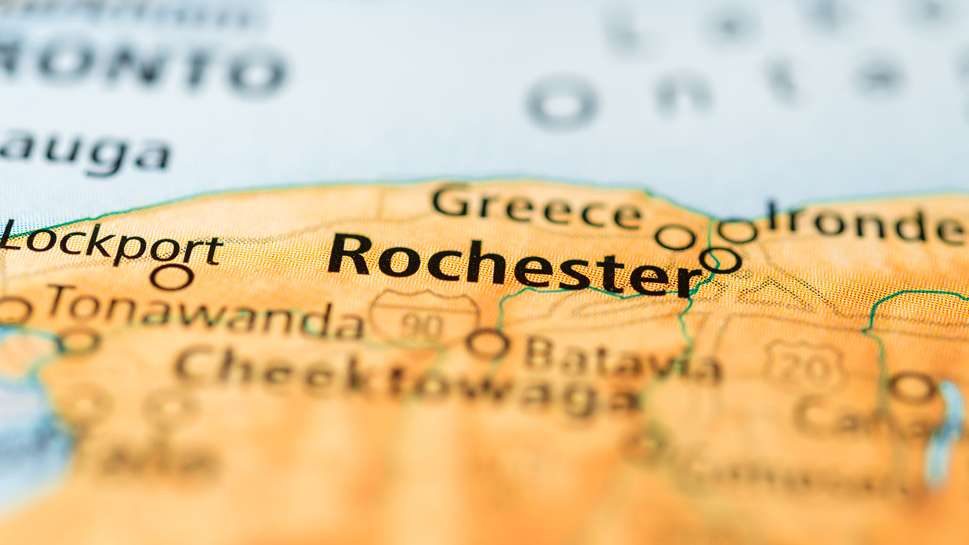 Contact The Angie Flack Brown Team in Rochester, NY. A close up of a map of Rochester, NY