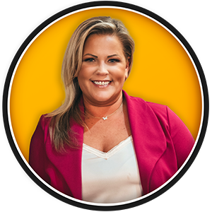 Round headshot of rachel mcaloose in a magenta suit with an orange background