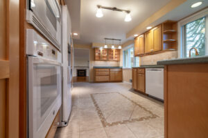 74 Harper Dr, Pittsford, Ny 14534 2 Kitchen with cabinetry and viking stove at 74 harper dr pittsford ny