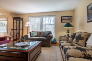 74 Harper Dr, Pittsford, Ny 14534 1 Living room with natural light at 74 harper dr pittsford ny