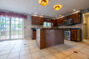 59 Emjay Ln, Rochester, Ny 14612 3 Kitchen with granite countertops and center island at 59 emjay ln rochester ny