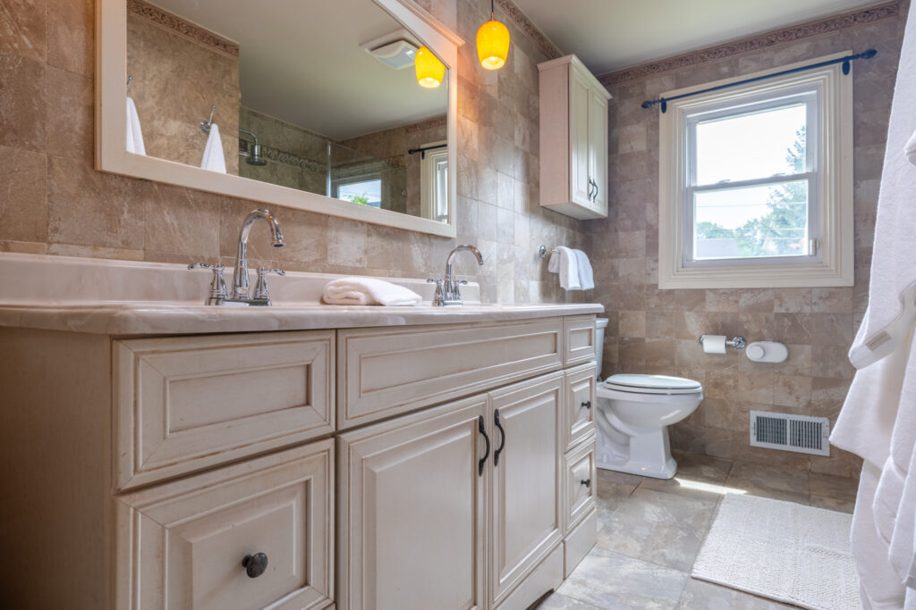 19 Warder Drive, Pittsford, Ny 14534 4 Updated full bathroom with modern finishes in the colonial home at 19 warder drive.