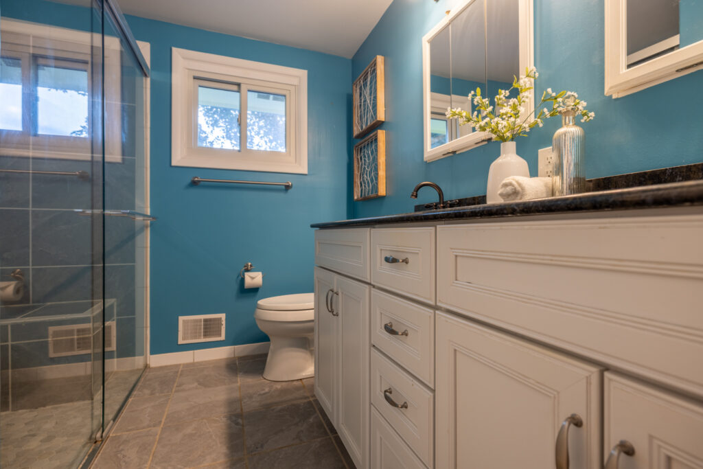 104 Ashley Dr, Rochester, NY 14620 5 Updated upper full bath at 104 Ashley Drive in Brighton, NY with double vanity and glass shower