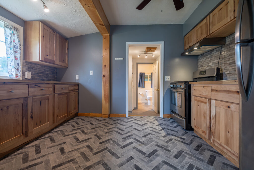 154 Norwood Ave, Rochester, NY 14606 3 Remodeled kitchen at 154 Norwood Avenue in Gates, NY with wood cabinets and butcher block counters