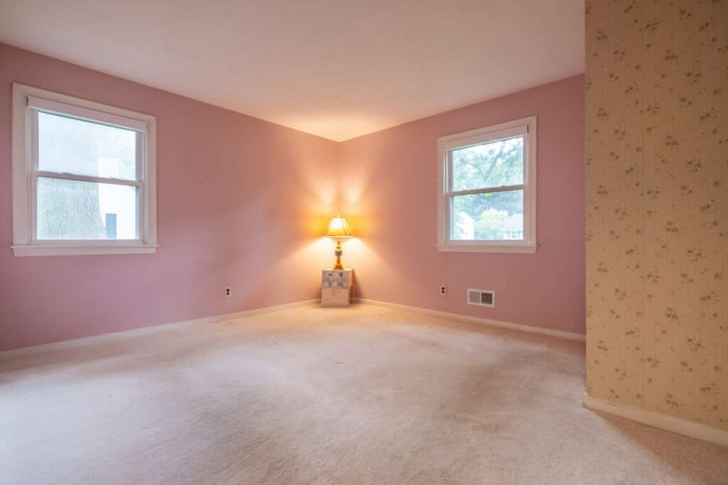9 Brewster Lane, Rochester, NY 14624 5 First-floor bedroom at 9 Brewster Lane in Gates, NY with large windows and natural light