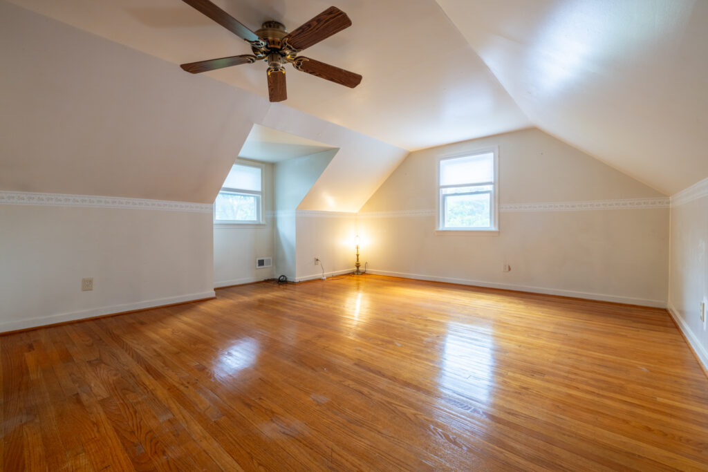 9 Brewster Lane, Rochester, NY 14624 6 Upper bedroom at 9 Brewster Lane in Gates, NY with hardwood floors and Cape Cod ceiling