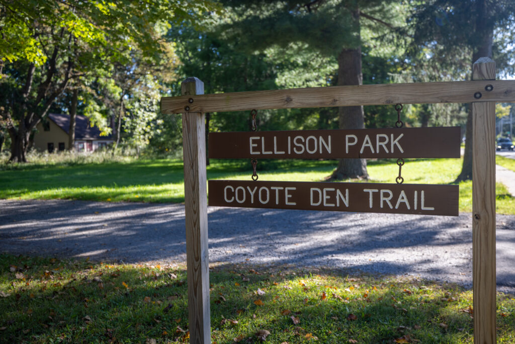 112 Burrows Hills Dr, Rochester, NY 14625 2 Wooden sign for the Coyote Den Trail at Ellison Park